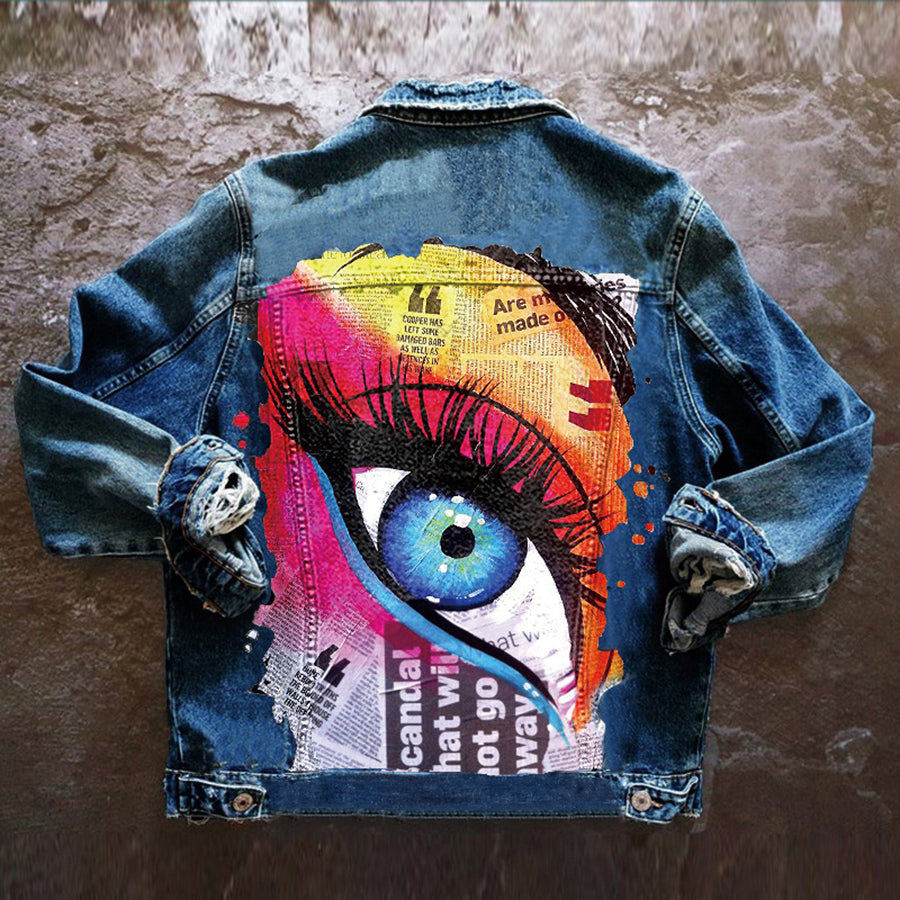 Women's denim jacket with colourful graphic eye print on the back