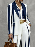 Women's navy and white striped blazer with notched lapels and long sleeves