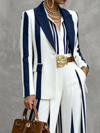 Women's navy and white striped blazer with notched lapels and long sleeves