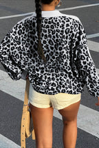 Women's leopard print sweatshirt with collared V-neck and number graphic