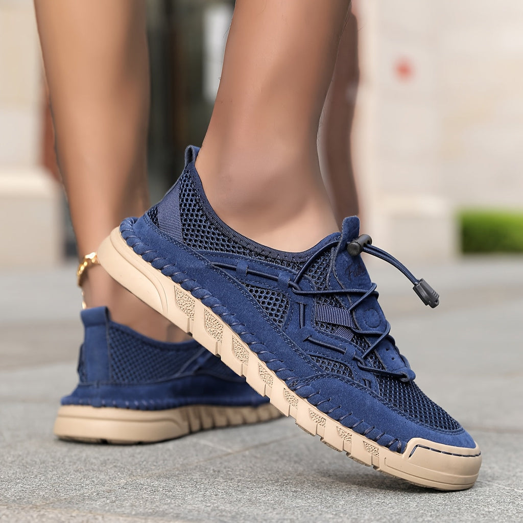 Mesh sneakers with toggle laces and segmented flat soles