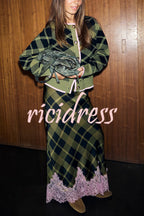 Women's green plaid cardigan with pink trim and buttons