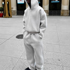 Men's plain hooded sweatshirt and matching jogger set with long sleeves and drawstring trousers