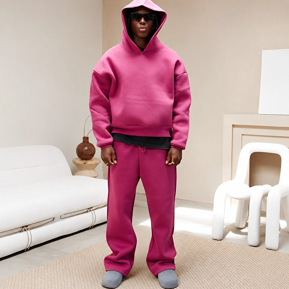 Men's plain hooded sweatshirt and matching jogger set with long sleeves and drawstring trousers