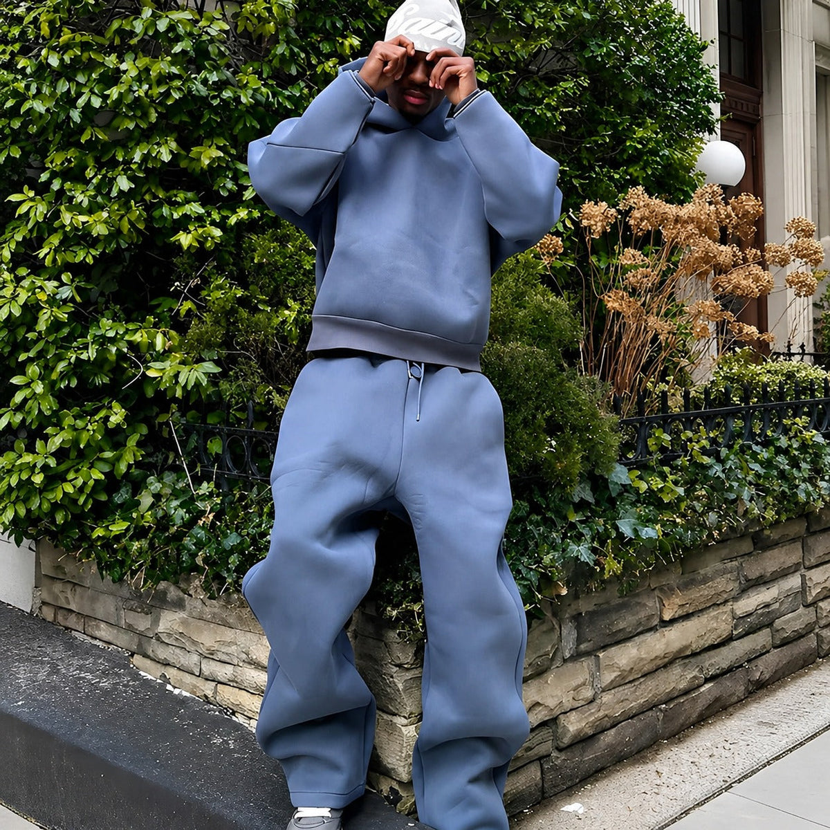 Men's plain hooded sweatshirt and matching jogger set with long sleeves and drawstring trousers