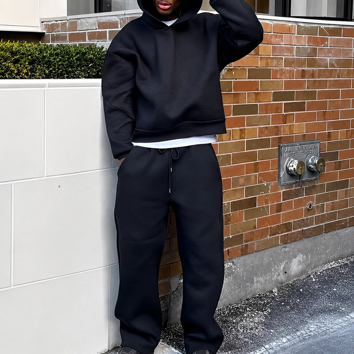 Men's plain hooded sweatshirt and matching jogger set with long sleeves and drawstring trousers