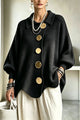 Women's oversized ribbed cardigan with collared neckline, balloon sleeves and large front buttons