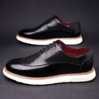 Textured lace-up Oxford shoes with rounded toes and contrasting layered soles