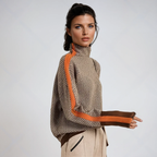 Women's geometric turtleneck sweater with contrasting sleeve stripes