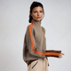 Women's geometric turtleneck sweater with contrasting sleeve stripes