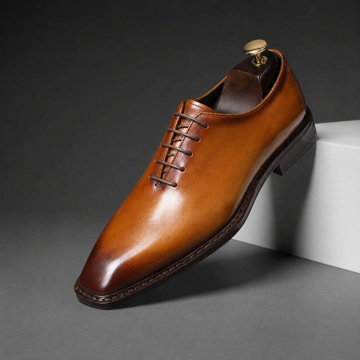 Men's wholecut lace-up Oxford shoes with a burnished finish and square toe