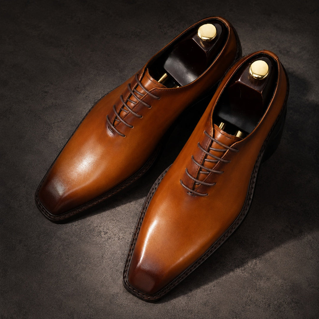 Men's brown wholecut lace-up Oxford shoes with a burnished finish and square toe
