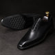Men's black wholecut lace-up Oxford shoes with a burnished finish and square toe