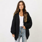 Women's oversized textured knit cardigan with open front and long sleeves