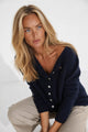 Women's button front cardigan with long sleeves and front pockets