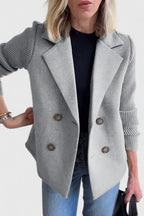 Women's short double-breasted coat with lapels and ribbed knitted sleeves