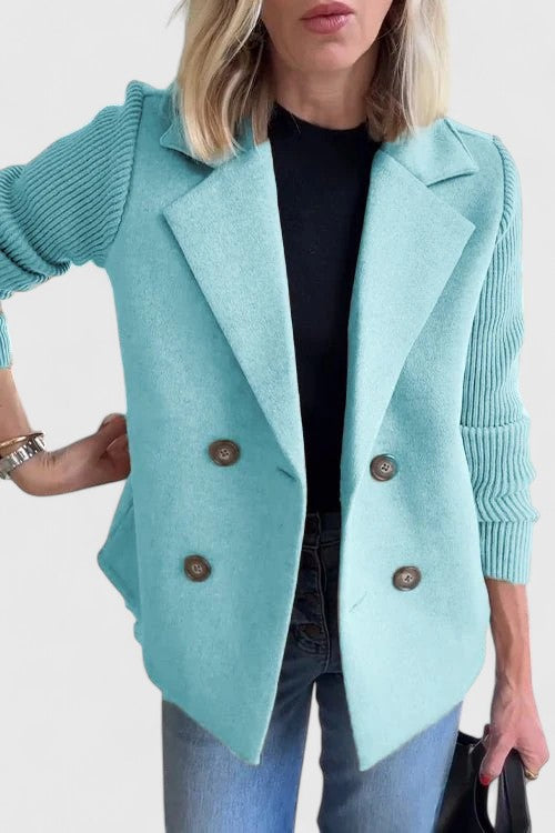 Women's short double-breasted coat with lapels and ribbed knitted sleeves