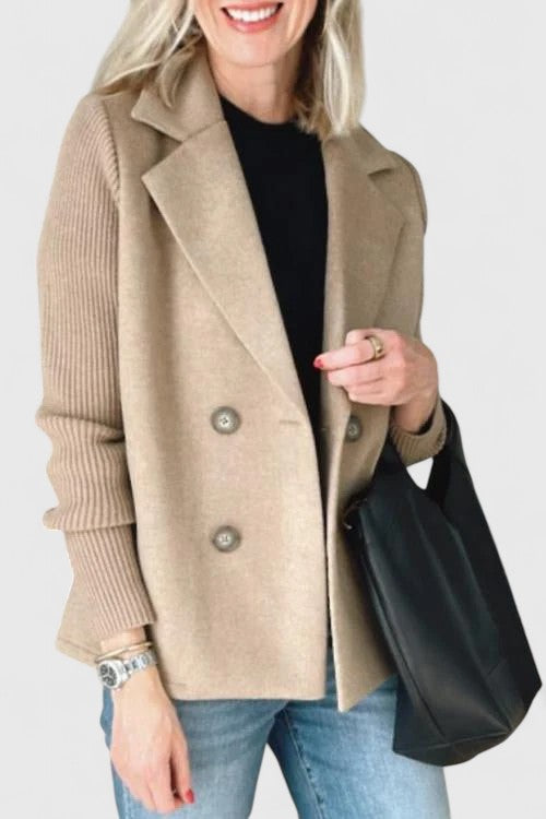 Women's short double-breasted coat with lapels and ribbed knitted sleeves