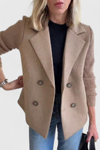 Women's short double-breasted coat with lapels and ribbed knitted sleeves