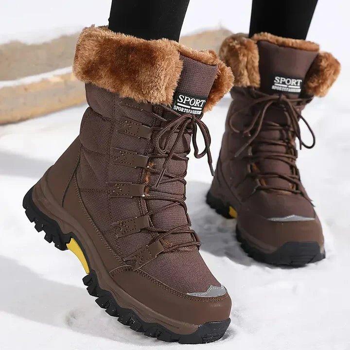 Women's lace-up winter boots with faux fur collar and lug sole