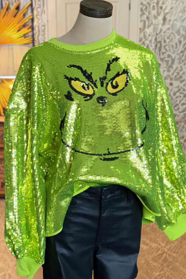 Women's bright green Grinch face sequin jumper with long sleeves