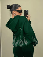 Women's hooded sweatshirt with rhinestone flame detailing on the back and sleeves