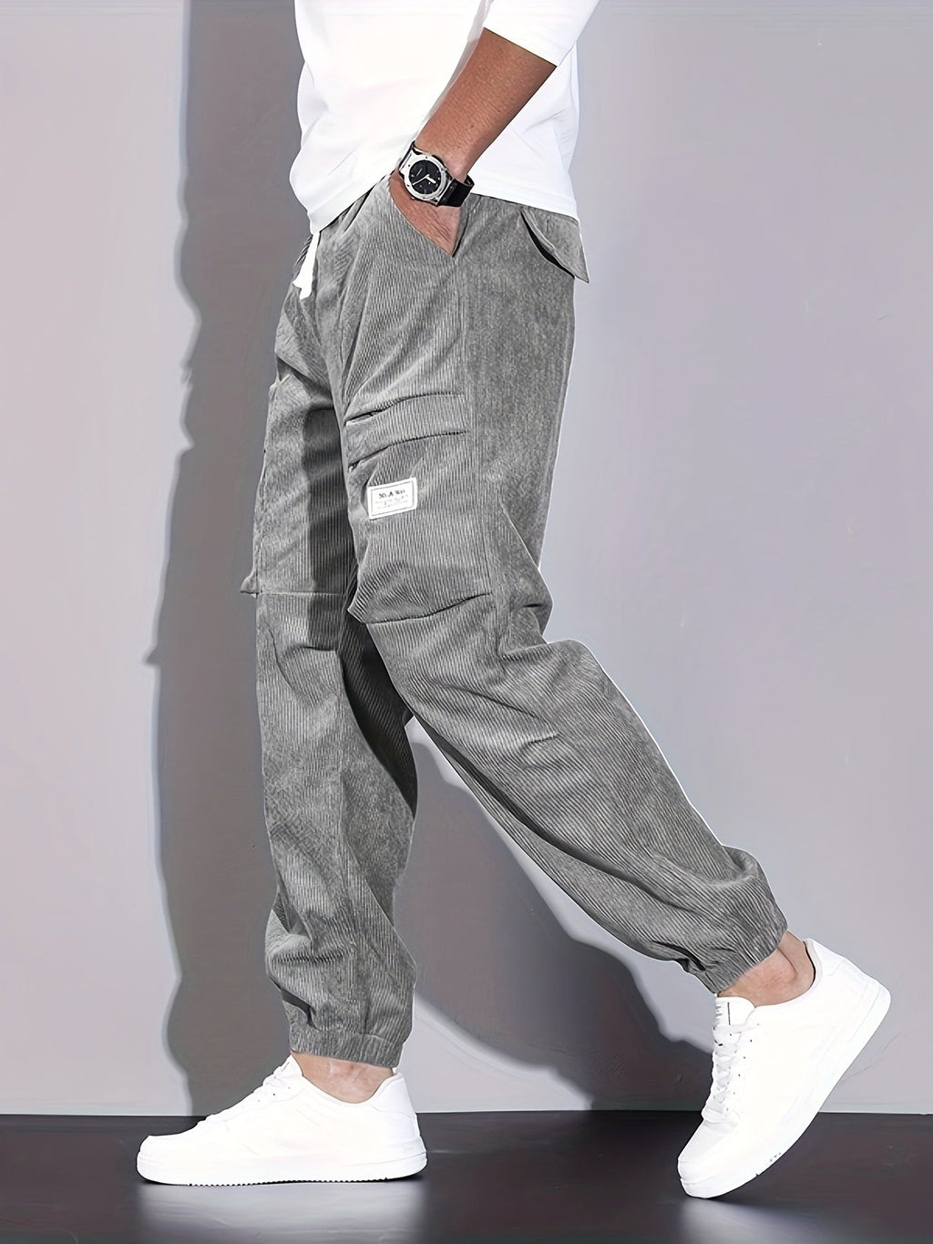 Men's corduroy cargo trousers with drawstring waist and cuffed hems