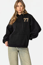 Women's oversized pullover hoodie with number graphic and kangaroo pocket