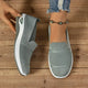 Women's knit slip-on sneakers with textured panels and white soles