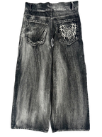 Gray wide leg jeans with frayed spiderweb detailing