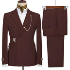 Men's two-piece suit with notched lapels, chain detail, buckle accents and matching trousers