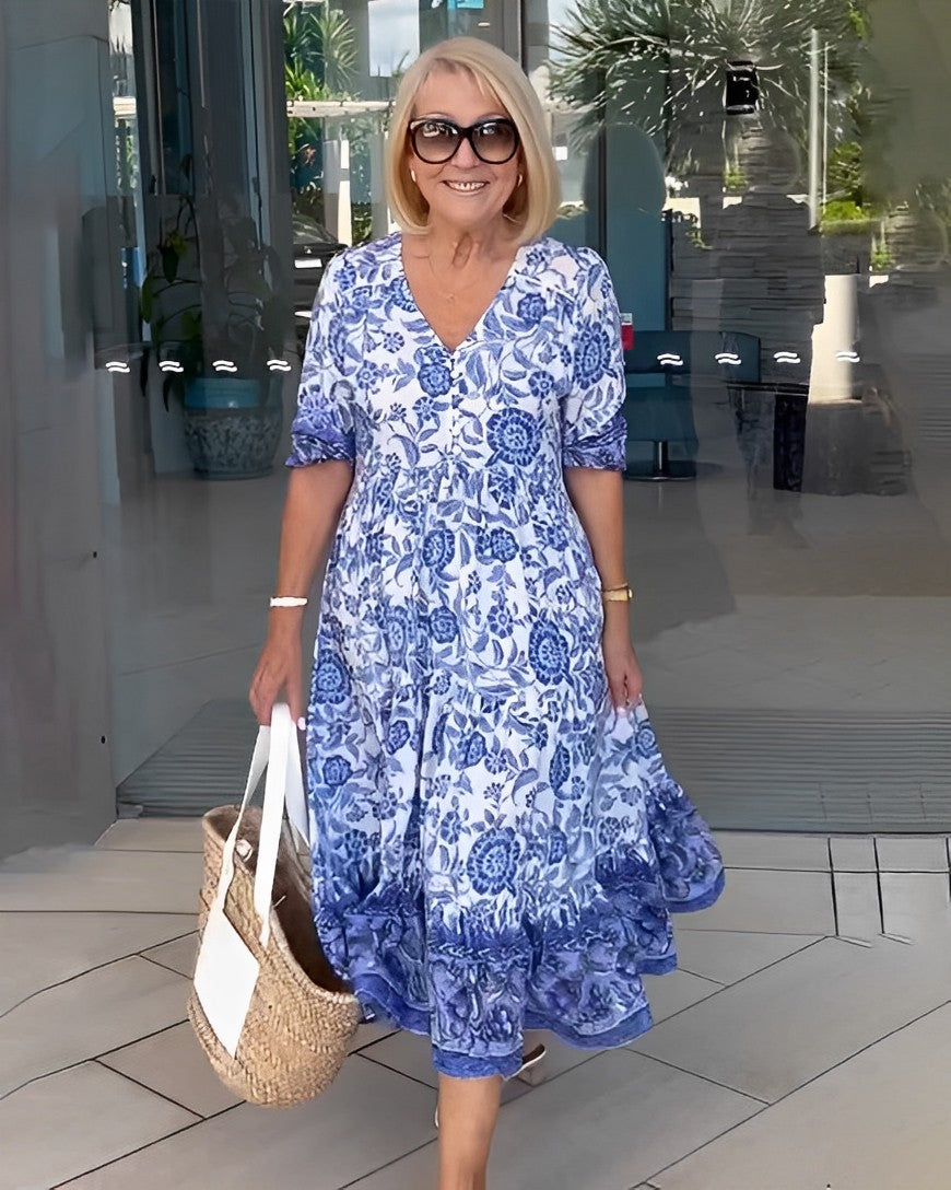 Women's floral V-neck midi dress with three-quarter sleeves