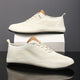 Knit sneakers with lace-up fronts, round toes and pull tabs
