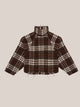 Women's brown plaid cropped turtleneck top with long sleeves and fringed edges