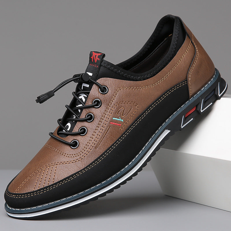 Men's lace-up Oxford-style shoes with contrasting panels and flat patterned soles