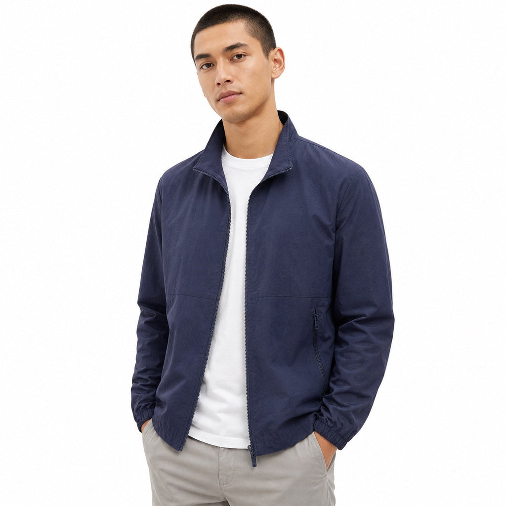 Men's plain windbreaker jacket with stand collar, full zip and zipped pockets