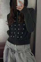 Women's black fitted hoodie with studded front trims and zip fastening