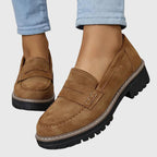 Women's penny loafers with round toes and low lug soles