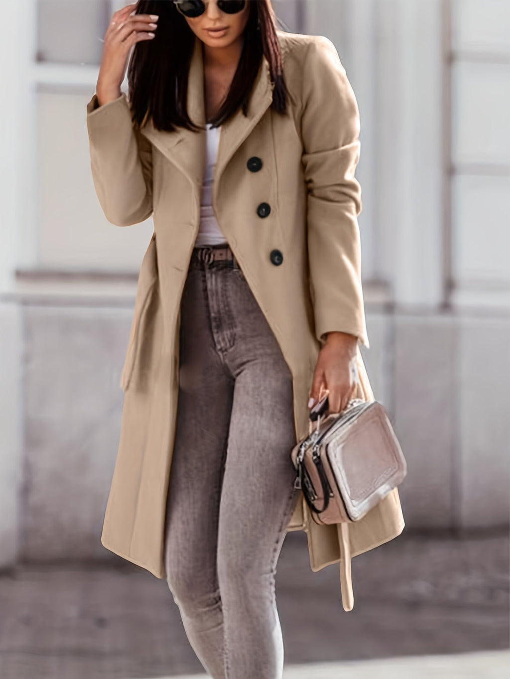 Women's beige long double-breasted trench coat with notched lapels