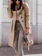 Women's beige long double-breasted trench coat with notched lapels