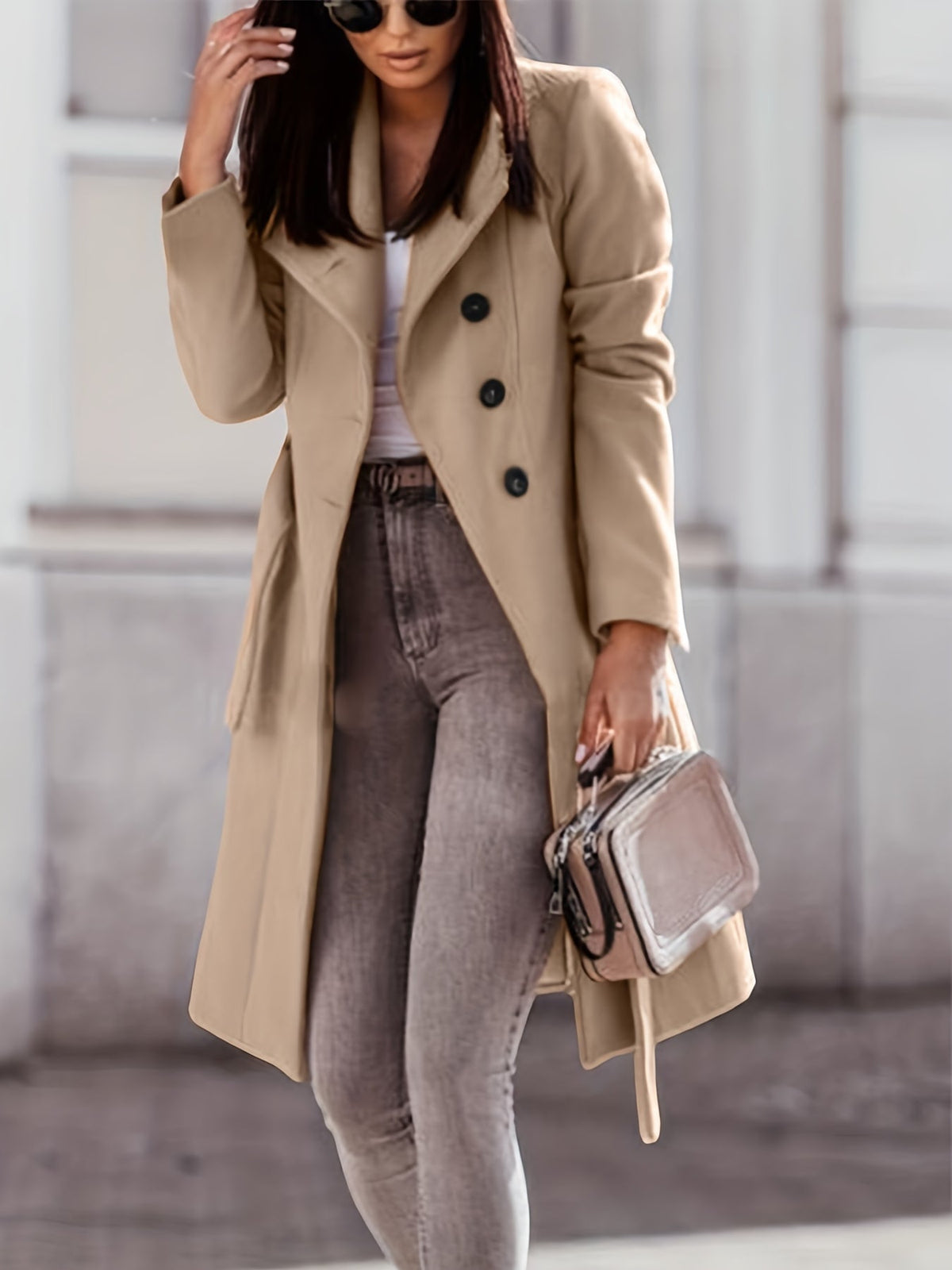Women's beige long double-breasted trench coat with notched lapels