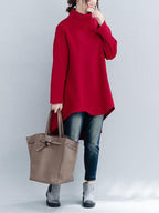 Women's loose turtleneck sweatshirt with long sleeves and a hi-low hem