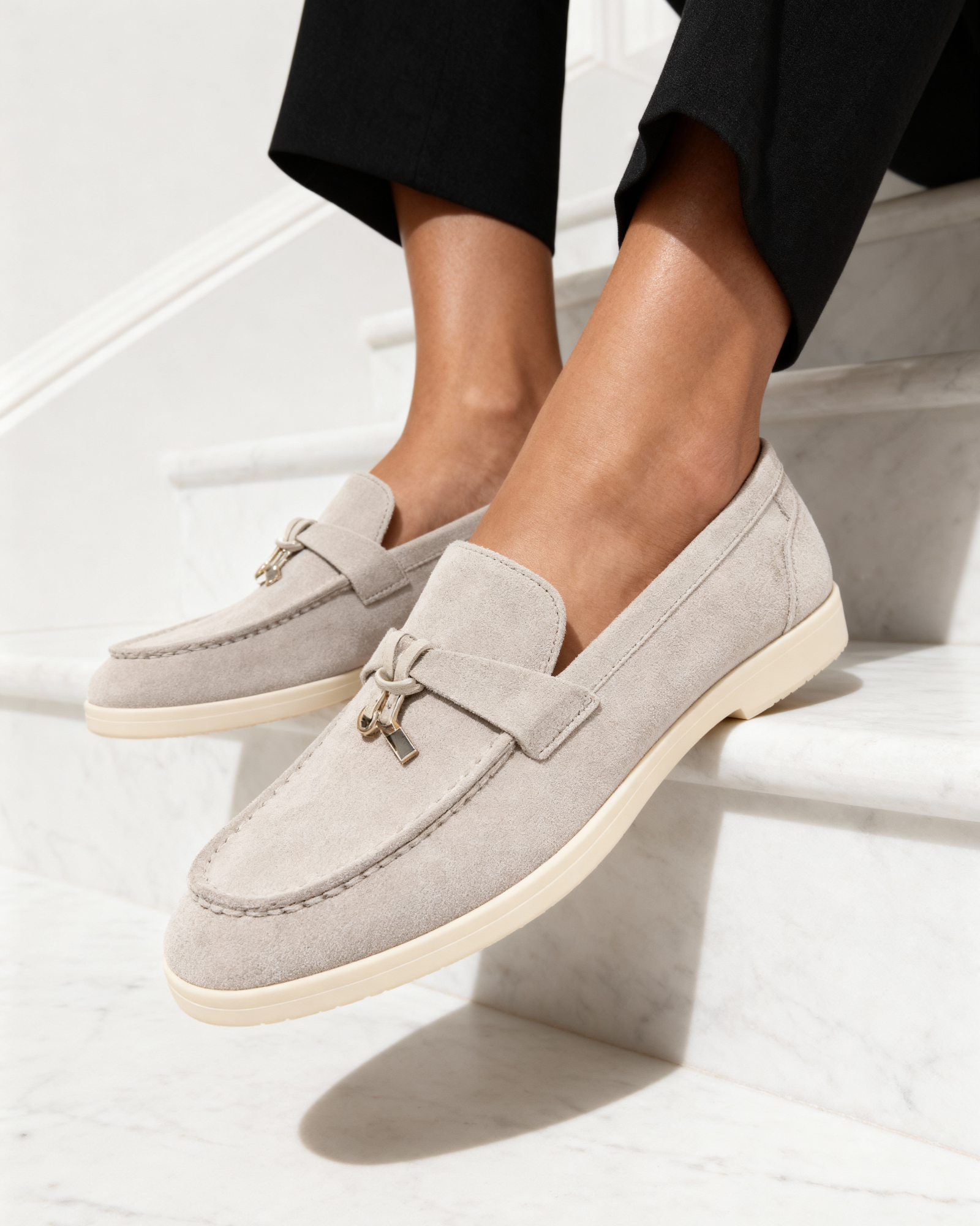 Women's slip-on loafers with moc toe stitching and metal horsebit detail