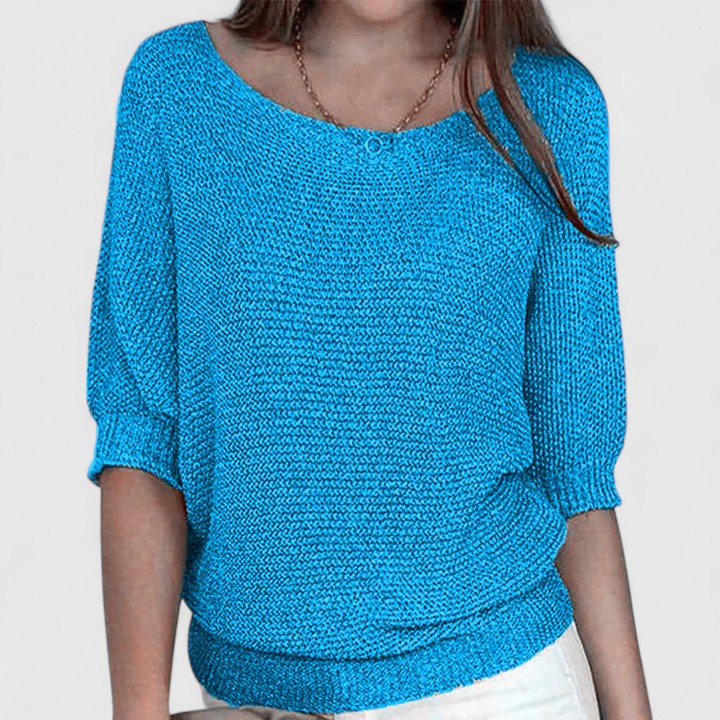 Women's textured knit pullover with round neckline and three-quarter sleeves