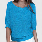 Women's textured knit pullover with round neckline and three-quarter sleeves