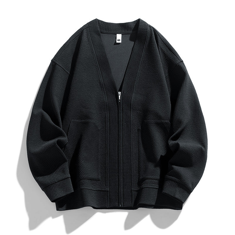 Men's textured knit cardigan with V-neck, zip front and patch pockets