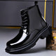 Unisex glossy lace-up combat boot with round toe and chunky lug sole