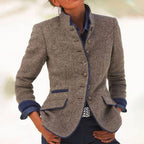 Women's brown button-front jacket with blue contrast edging