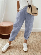 Women's cropped striped trousers with elastic waist and cuffed hems