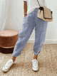Women's cropped striped trousers with elastic waist and cuffed hems